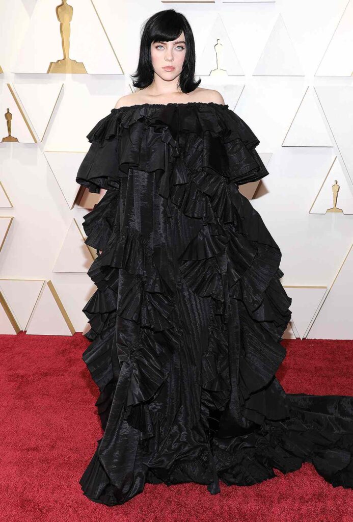 Billie Eilish wore a custom ruffled black Gucci gown to the 94th Academy Awards.