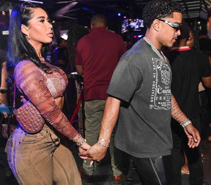 Justin Combs and Stephanie Rao holding hands