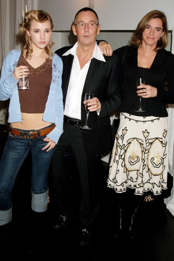 Suki Waterhouse's parents, Norman and Elizabeth, attend an event in her earlier years as a model